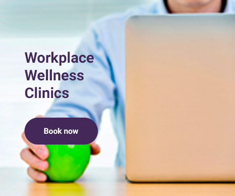 An image shows a person holding a cup and working on a laptop with text reading: Workplace Wellness Clinics.